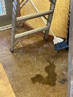 water on the floor after a hard rain 
