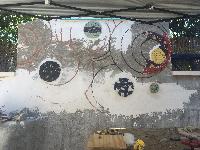 First tiles being adhered to the wall! 