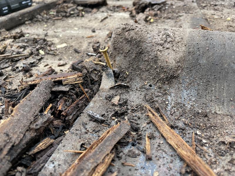 Here, a screw that was too long was used, going through the sleeper into the waterproof membrane. 