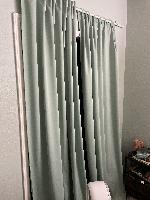There used to be bifold doors here. They are not in the shed. The curtains are somewhat haphazard 