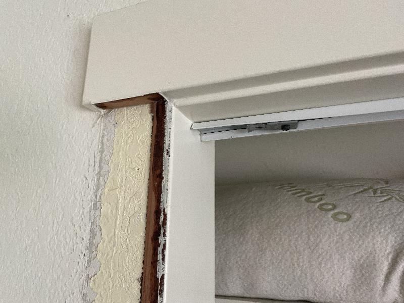 Removing trim from around existing closet 