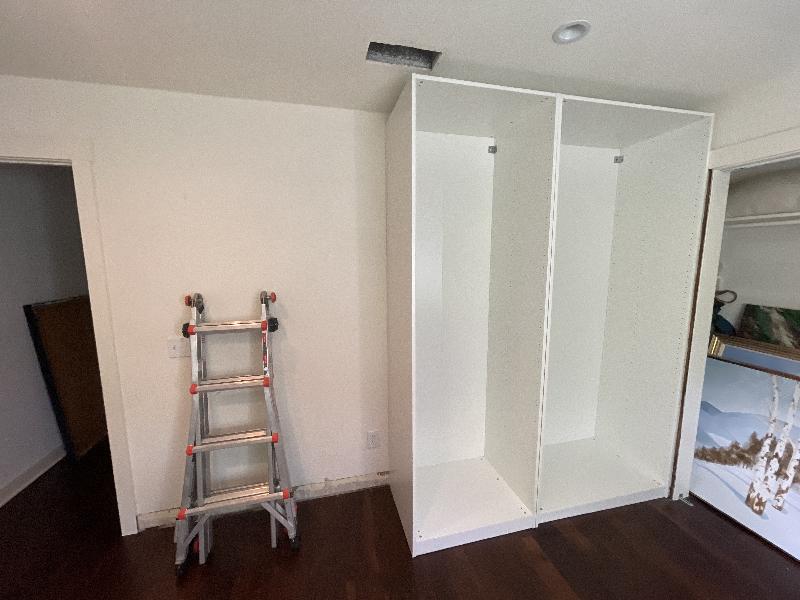 Second cabinet goes in, revealing an issue with the AC vent. That will need to move. 