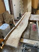I cut off one live edge and glued it back on to get enough thickness for the mounting system. 