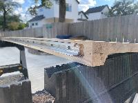 Shelf side of bracket