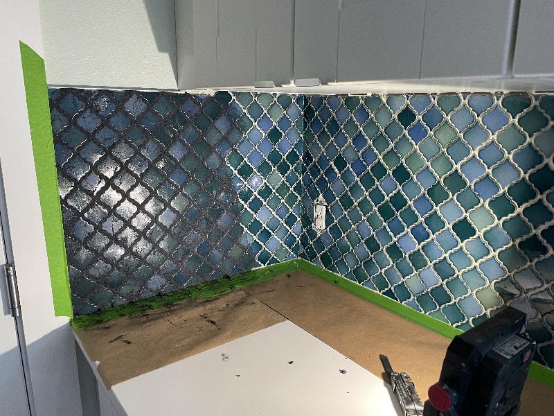 Starting to apply grout 