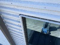 Comparing the top edge of the second floor window that doesn't leak 