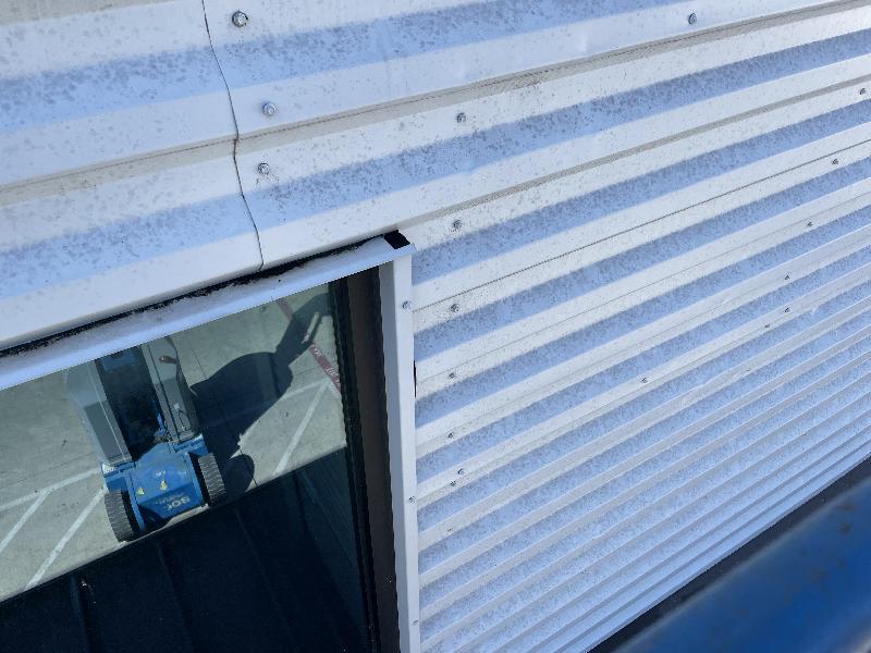 Comparing the top edge of the second floor window that doesn't leak 