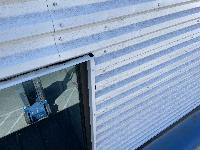 Comparing the top edge of the second floor window that doesn't leak 