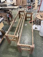 Two bench frames, one with stretcher installed 