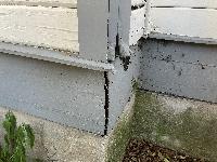 More damage at the same corner. 