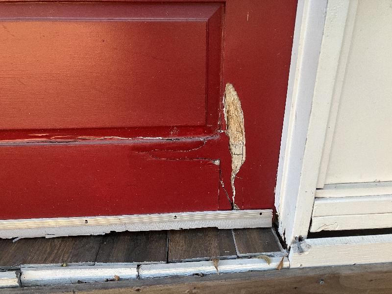 This door has some pretty bad damage. 