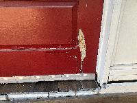 This door has some pretty bad damage. 