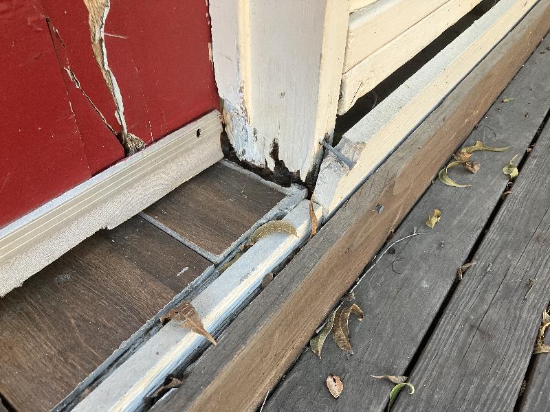 The door frame here is badly rotted.