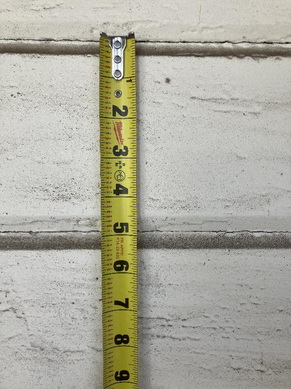 Measuring the exposed siding between the V-grooves 