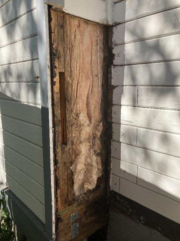 Showing siding sections on the abutting wall that need to be cut away. 