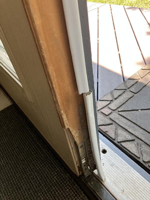 Bottom part of the t astragal and retaining pin. The weatherstripping needs to be replaced as well.