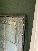 The glass insert after I scraped off the remaining shards of the exterior tempered glass pane.