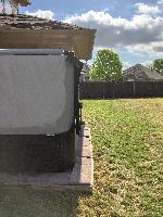 The current pavers are just barely wider than the tub itself. 