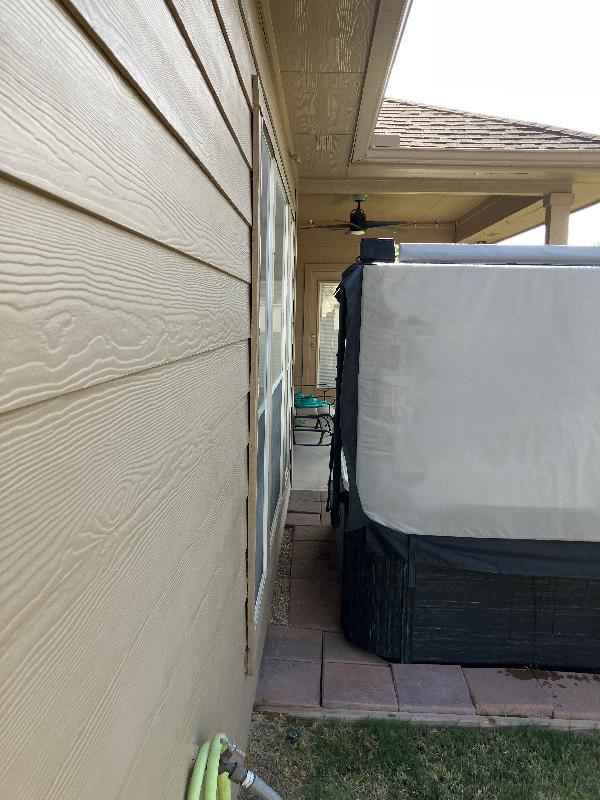 Not much room between the tub and the house. The client has a three year warranty on the tub (two years remaining), so we **cannot** move the tub to dig footings.